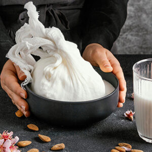 person-making-almond-milk-F0