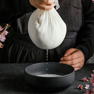 person-making-almond-milk-F02